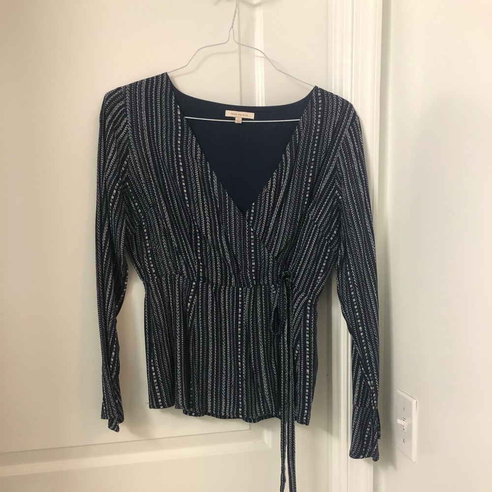 NWOT skies are blue long sleeve v neck blouse white, blue, and gold size small